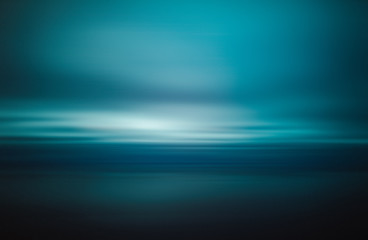 Serene ocean and horizon at blue hour