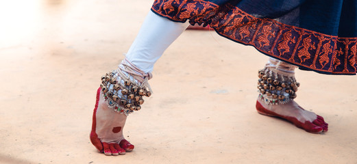 dance form indian classical feet with ghungru. close up, copy space. classical Indian culture and traditions