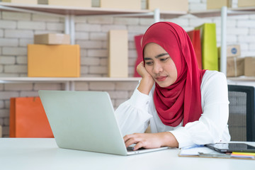Muslim women working at home, SME, Online shopping, Entrepreneur or online selling concept.