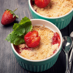 Crumble cake with strawberries. Fresh pastries with berries