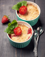Fresh pastries - baked dessert with strawberries - crumble