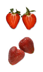 Strawberries with strawberry slice. Isolated on a white background. Organic food.