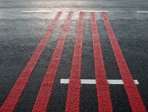 Red Rumble Strips On The Road.