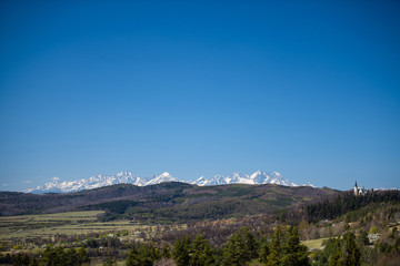 Basilica of the Visitation of the Blessed Virgin Mary in Levoca, peaks of High Tatras in background, Slovakia