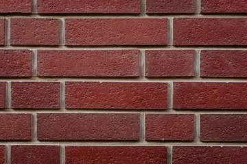 Picture of brick wall in train station. Horizontal of red cement wall. Background of brick wall texture in mesuem. Photo of ancient brickwork. Red stone brick wall.
