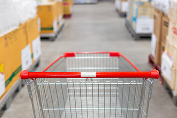 Shopping cart in supermarket, Abstract blurred photo in shopping malls, Cart in the market concept.