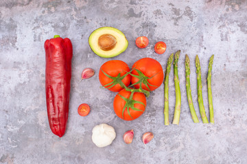 Red Pepper, Avocado, Garlic, Asparagus and Tomatoes Photo with Dark Background