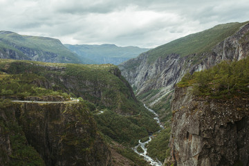mountain landscape of norway with a waterfall