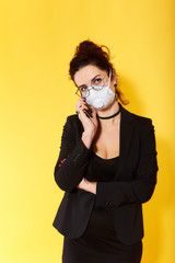 Business woman in glasses  wearing protective mask to Prevention for Coronavirus or Covid-19 Outbreak Situation - Concept, contagious disease, healthcare and Business.  Brunette