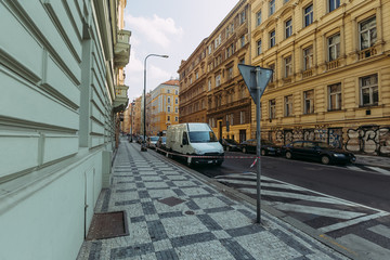 Fototapeta na wymiar street overlooking a yellow house in Prague