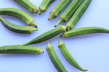 Fresh Young Lady Fingers or Okra in white background
