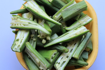 Fresh Young Lady Fingers or Okra in white background

