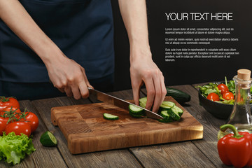 Woman cooking fresh vegetable salad. Female hands. Diet concept for healthy lifestyle with sample text.