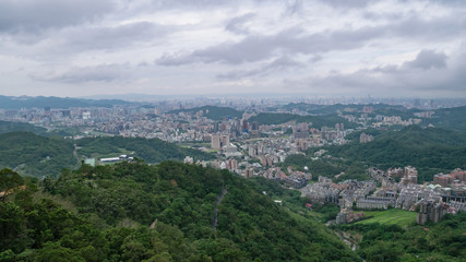 The landscape of building and mountain in Taipei city, Taiwan.