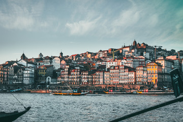 Panoramic landscape view on the old town with Douro river and famous iron bridge in Porto city...