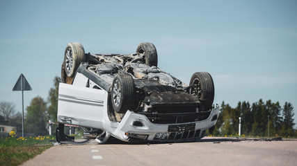 Horrific Traffic Accident, Rollover Smoking and Burning Vehicle Lying on its Roof in the Middle of...