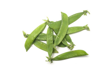 Closeup of organic flat green beans on white background