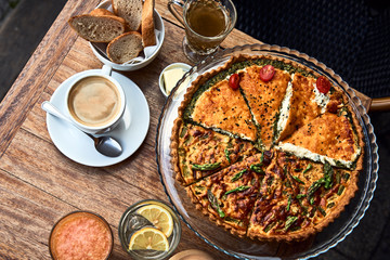 Coffee and quiche on a table