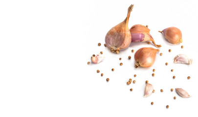 Group herbs consist of shallot ,garlic and coriander seeds isolated on white background.top view