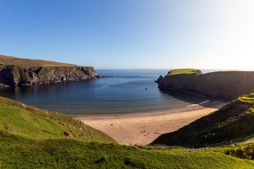 The Silver Strand Beach; Co Donegal; Ireland April 2019.
An idyllic Donegal beach surrounded by green mountains seen from above