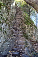 steps carved into the stone in a natural setting near Madrid. Spain