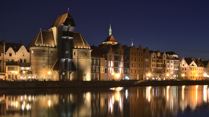 Gdansk crane over the water. Night photograph. Panorama view