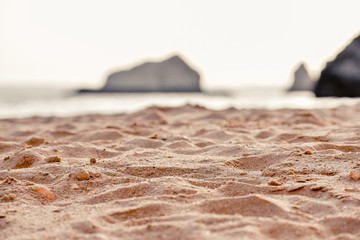 DEtail of sand of Empty beach between cliffs. Uncrowded travel concept. Algarve, Portugal
