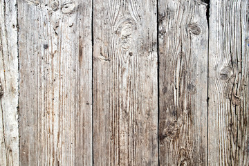 Wooden texture with scratches and cracks. Old wooden background.