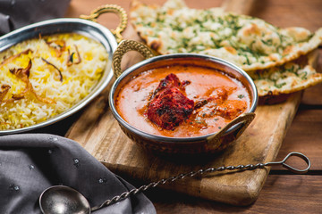 Traditional indian cuisine naan curry masala biryani rice kitchen towel panir