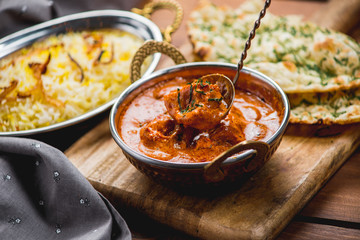 Traditional indian cuisine naan curry masala biryani rice kitchen towel panir