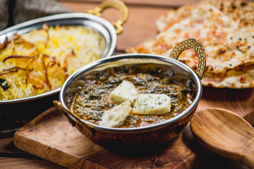 Traditional indian cuisine naan curry masala biryani rice kitchen towel panir