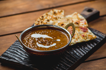 Traditional indian cuisine naan curry masala biryani rice kitchen towel panir