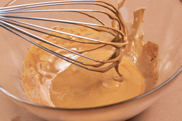 manual for dalgona coffee from tiktok. whisk sugar, coffee and water until smooth cream. close up...