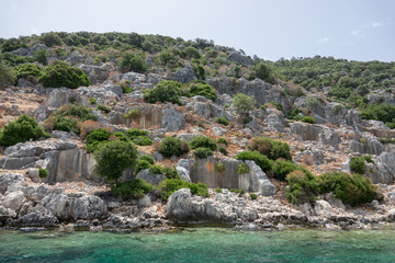 Ruins of sunken ancient city of Dolichiste on the northern part of the Kekova Island. Devastating...