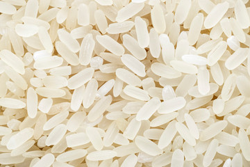 Rice grains close-up, top view. Background concept for design.