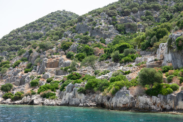 Ruins of sunken ancient city of Dolichiste on the northern part of the Kekova Island. Devastating earthquake in the 2nd century AD