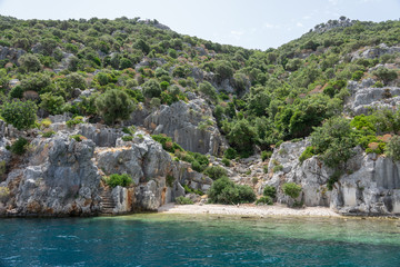 Ruins of sunken ancient city of Dolichiste on the northern part of the Kekova Island. Devastating...