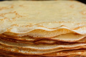 Homemade pancakes close-up. Appetite, tender, fresh, beautiful pancakes for tea or coffee.