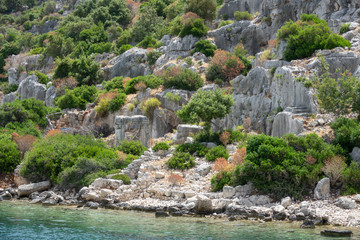 Ruins of sunken ancient city of Dolichiste on the northern part of the Kekova Island. Devastating earthquake in the 2nd century AD