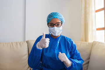 Fototapeta na wymiar Portrait of a nurse wearing a mask in the hospital