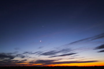 Dusk on a spring day with the moon and Venus
