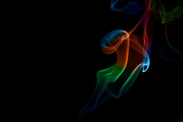 Obraz premium Abstract colored smoke on black background