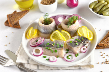 Salted herring with spice and onion