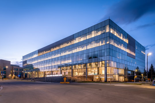 Calgary, Alberta - May 2, 2020: The Riddell Library and Learning Centre on the Mount Royal University campus in Calgary at night. MRU is one of Calgary's big universities 