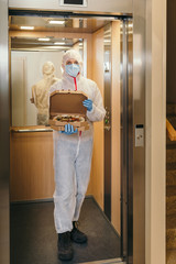 Safe pizza home delivery during virus outbreak and quarantine.