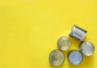 Set of preserves on a yellow background with place for text. View from above. Food delivery.