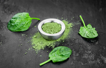 Homemade spinach powder (close up; selective focus)