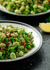 Vegan Green broad beans and quinoa salad with sweet peas and mint. Healthy food.