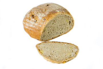 Fototapeta na wymiar Light Bread Loaf With A Slice