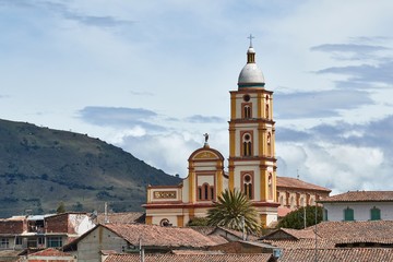 Fototapeta na wymiar Church tower in El Cocuy, mountain village in Colombia